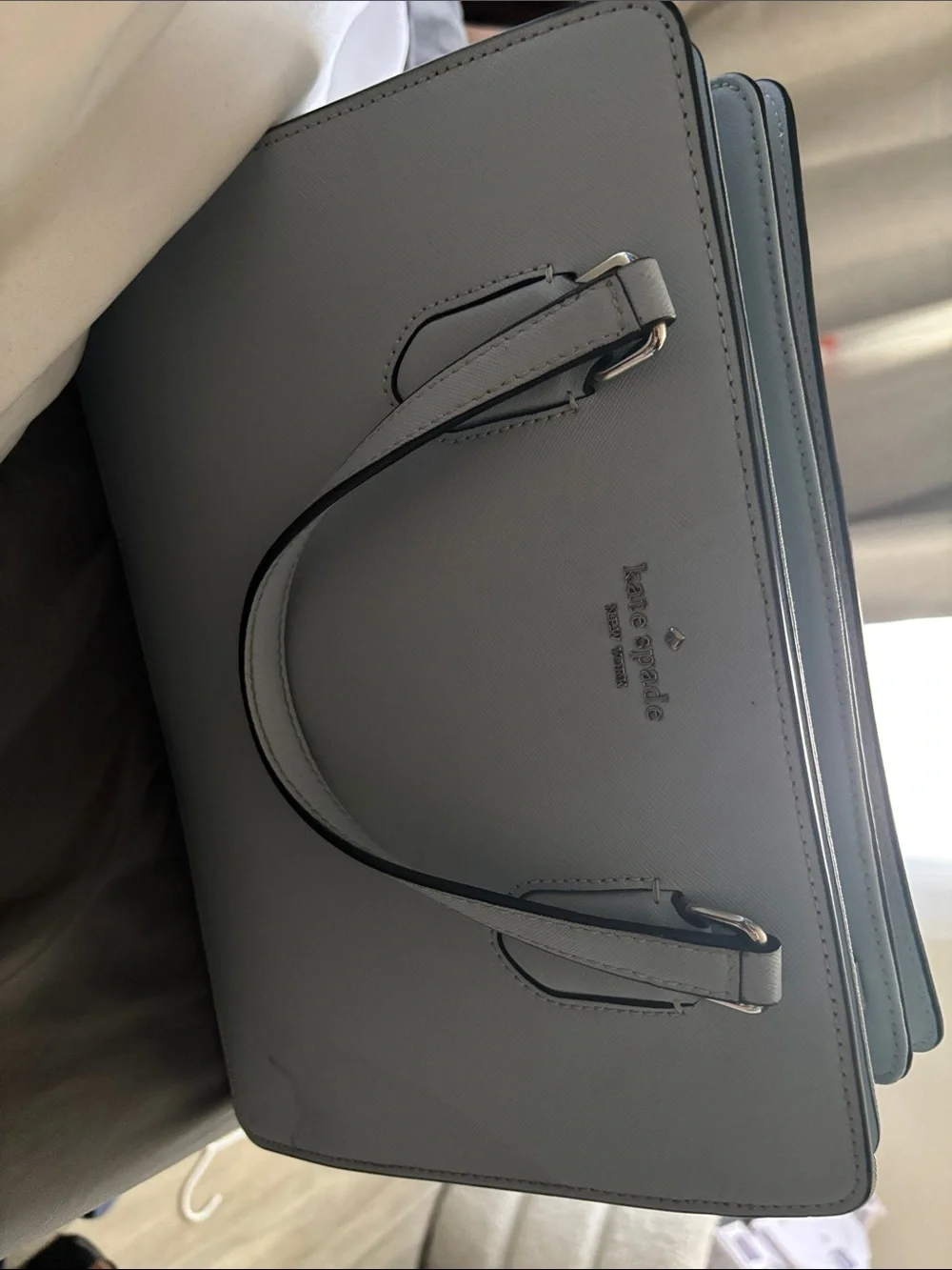 kate spade Light Blue Saffiano Top-Handle Briefcase Middle compartment is dirty